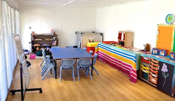 Inside the classroom's bright, insulated interior